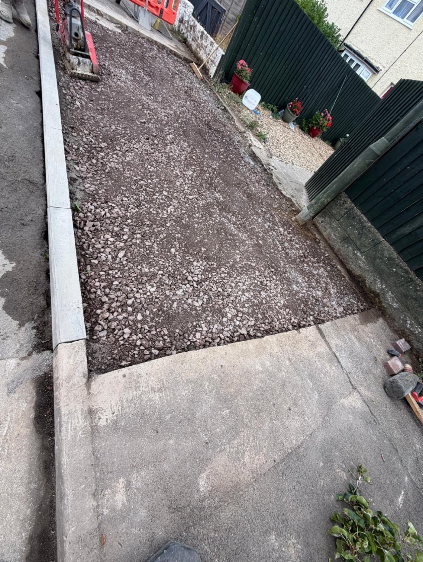 New dropped kerbs laid and driveway sub-base compacted in Gravesend, Kent